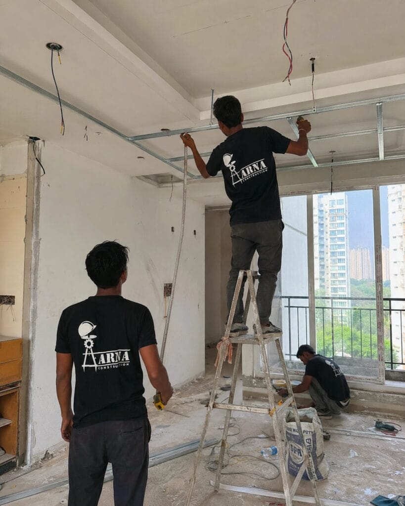 Bedroom wardrobe carpentry by Aarna Constructions in Greater Noida