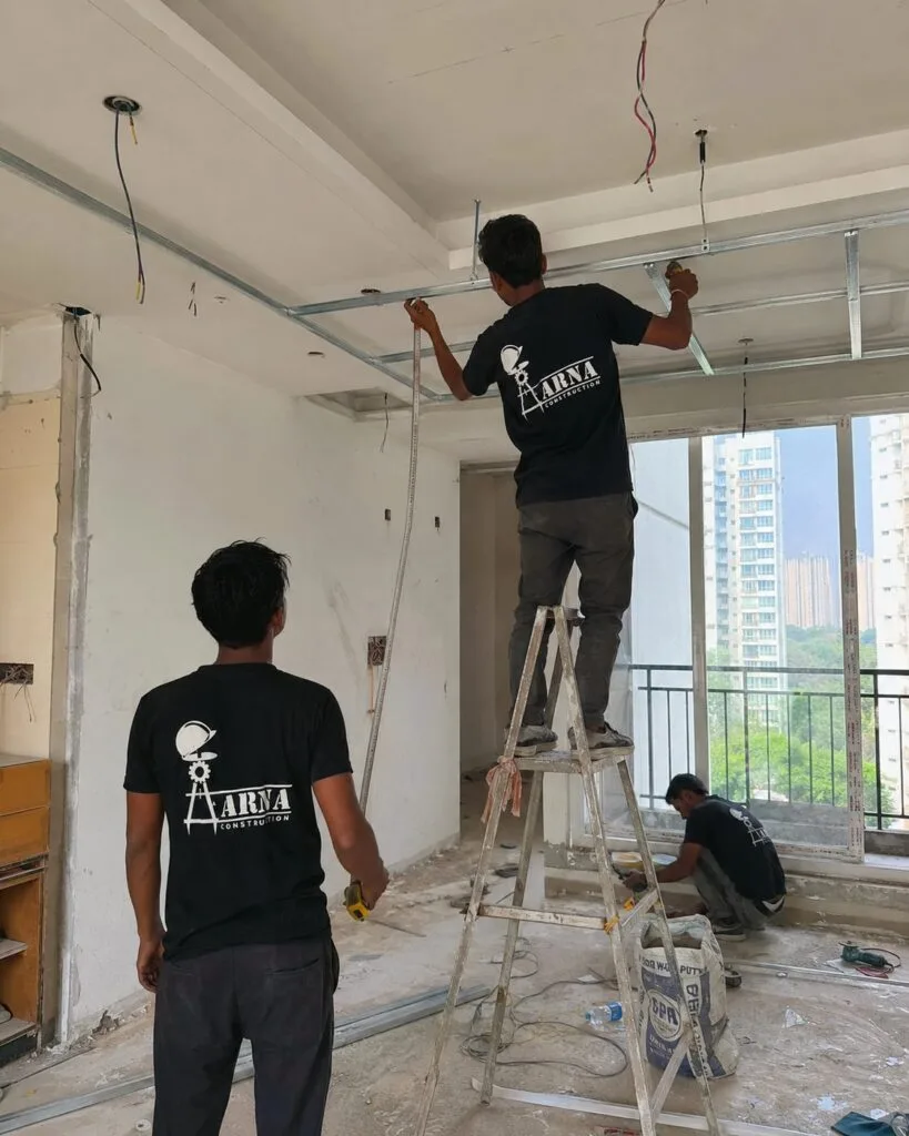Bedroom wardrobe carpentry by Aarna Constructions in Greater Noida