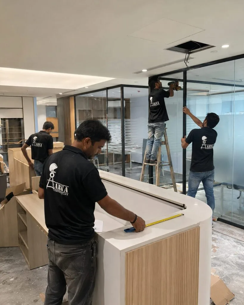 Office glass partition installation by Aarna Constructions in Greater Noida