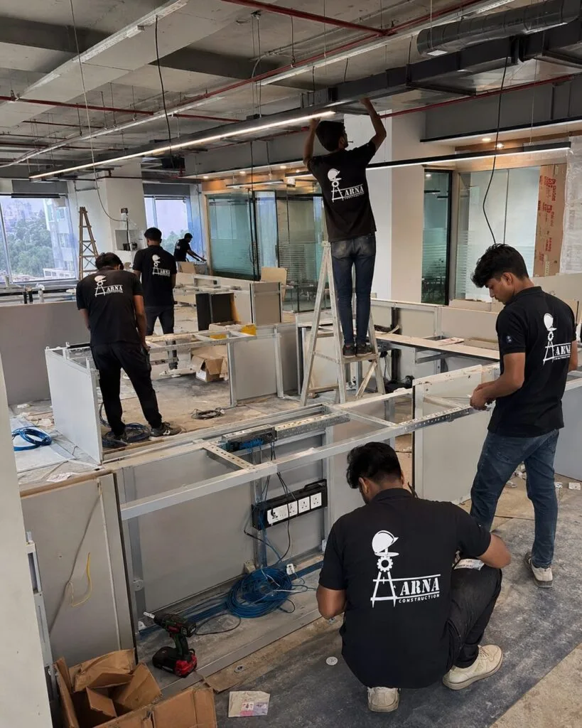 Showroom interior shelving by Aarna Constructions in Greater Noida